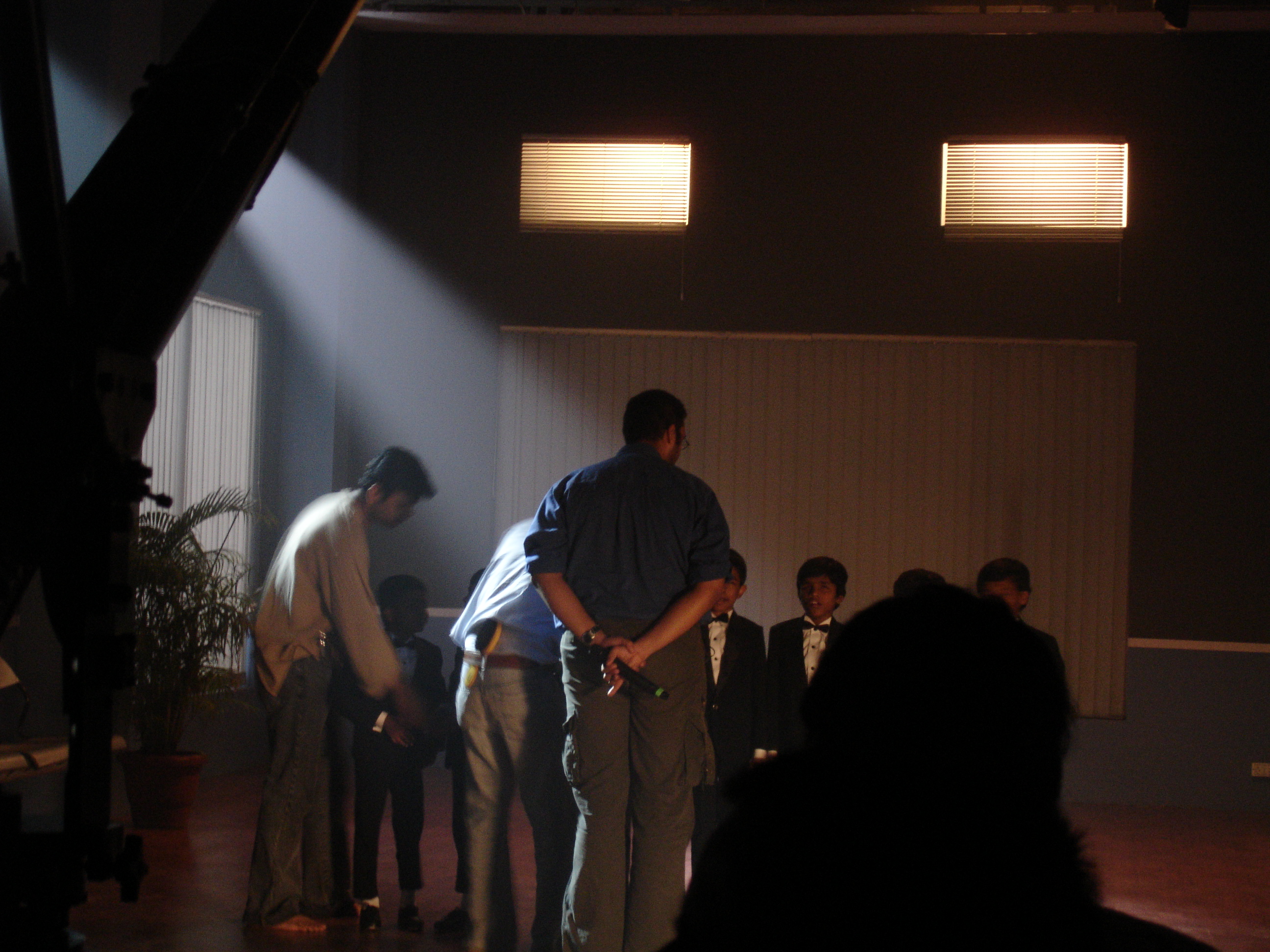 Filming on the set of 'Seven', the film by Kumar Bhatia: Anand Kaushik Parashar overseeing the choreography of the child-artists.